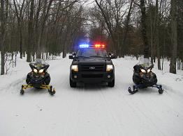 Truck with Two Snowmobiles